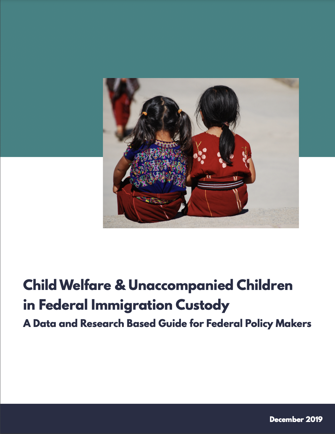 Report Cover with photo from behind of two children sitting