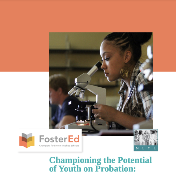 Report cover with photograph of student at a microscope