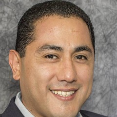 Portrait photograph of Frankie Guzman