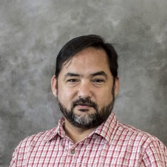 Portrait photograph of Jason Sutton