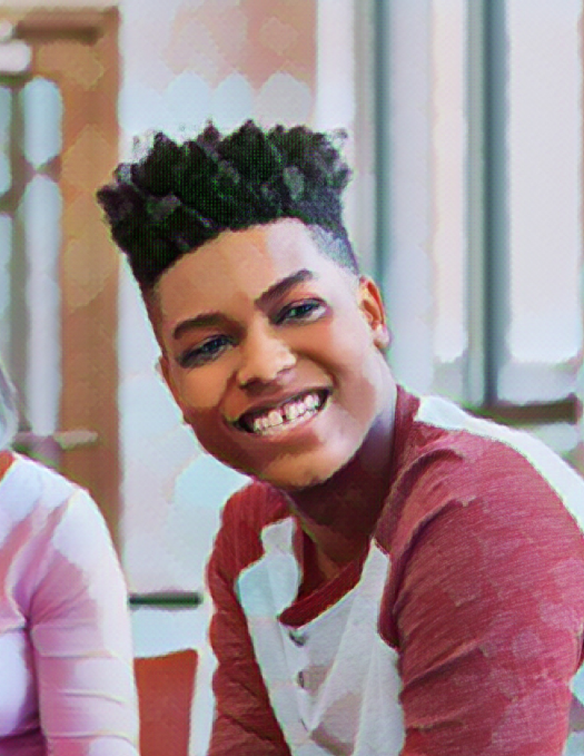 Young person sitting and smiling