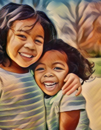 Two young children hugging and smiling