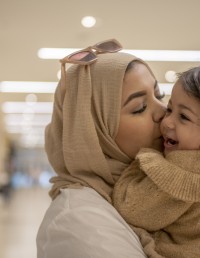 Mother hugging her child