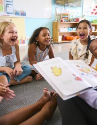 Young children enjoying storytime at school