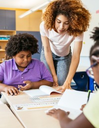 Teacher supports students in class